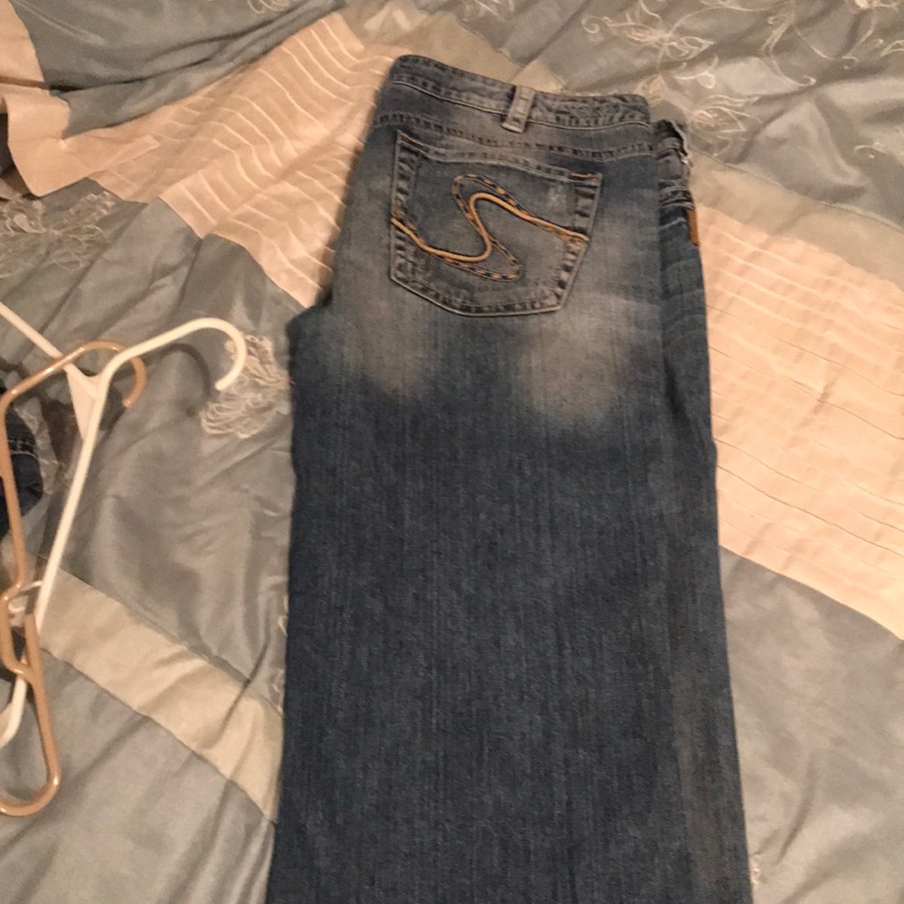 Women’s silver jeans distressed